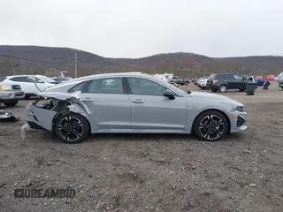2024 Kia K5 GT-Line z VIN 5XXG64J22RG228095, wystawiony jako IAAI lot #41888510 z przebiegiem 11 927 mil mil oraz . Historia ofert i sprzedaży dostępna na DreamBid. Obrazek 14.