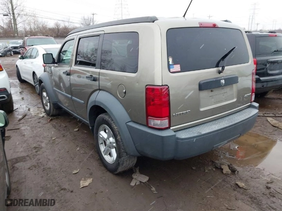 2007 Dodge Nitro SXT with VIN 1D8GU28K37W554484, listed as a IAAI auction lot 41565252 with 156,717 mi miles. Bid and sale history available at carsss.com. Image 3.