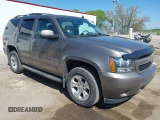 2013 Chevrolet Tahoe LT with VIN 1GNSKBE00DR230055, listed as a IAAI auction lot 42186301 with 223,553 mi miles and . Bid and sale history available at DreamBid. Image 1.