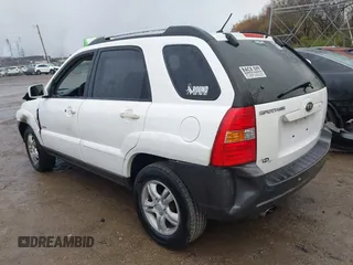 2006 Kia Sportage LX z VIN KNDJE723267254864, wystawiony jako IAAI lot #40875961 z przebiegiem 295 412 mil mil oraz . Historia ofert i sprzedaży dostępna na DreamBid. Obrazek 3.