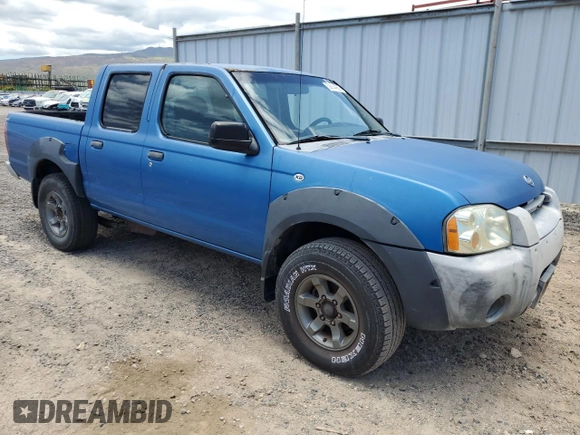 2001 Nissan Frontier SE with VIN 1N6ED27T91C390230, listed as a Copart auction lot 58844905 with 157,883 mi miles and Salvage title. Bid and sale history available at DreamBid. Image 4.