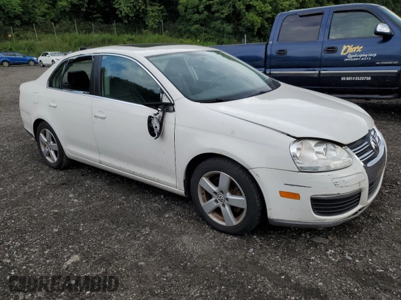 2009 Volkswagen Jetta SE with VIN 3VWRZ71K69M120110, listed as a Copart auction lot 64813905 with 114,552 mi miles and Salvage title. Bid and sale history available at DreamBid. Image 4.
