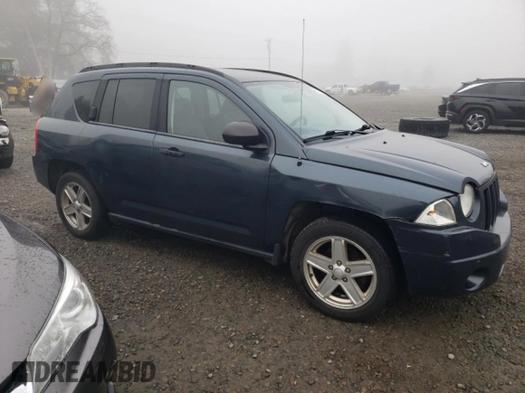 2007 Jeep Compass Sport with VIN 1J8FT470X7D261453, listed as a Copart auction lot 81710234 with 174,118 mi miles and Salvage Title. Bid and sale history available at carsss.com. Image 4.