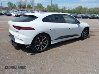 2020 Jaguar I-Pace SE with VIN SADHC2S1XL1F80407, listed as a IAAI auction lot 42033260 with 46,738 mi miles and . Bid and sale history available at DreamBid. Image 4.
