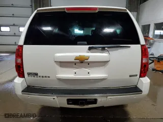 2012 Chevrolet Suburban LTZ with VIN 1GNSKKE74CR325522, listed as a Copart auction lot 52215745 with 214,973 mi miles and Clean Title. Bid and sale history available at carsss.com. Image 6.