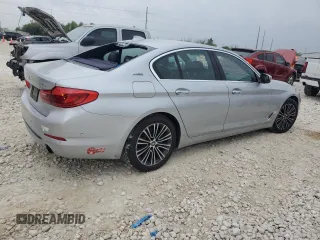 2018 BMW 5 Series 530e xDrive with VIN WBAJB1C58JB084292, listed as a Copart auction lot 51213575 with 105,277 mi miles and Clean title. Bid and sale history available at DreamBid. Image 3.