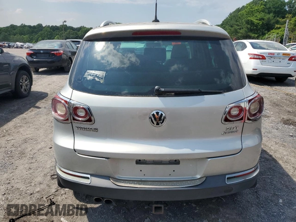 2011 Volkswagen Tiguan SEL z VIN WVGBV7AX4BW534922, wystawiony jako Copart lot #60486775 z przebiegiem Nie podano mil oraz Czysty tytuł • Clean title. Historia ofert i sprzedaży dostępna na DreamBid. Obrazek 6.