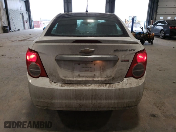 2014 Chevrolet Sonic LTZ with VIN 1G1JE5SB8E4217967, listed as a Copart auction lot 47609215 with 152,322 mi miles and Salvage Title. Bid and sale history available at carsss.com. Image 6.