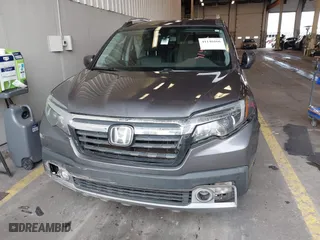 2017 Honda Ridgeline RTL-E with VIN 5FPYK3F73HB034764, listed as a IAAI auction lot 41146866 with 125,885 mi miles. Bid and sale history available at carsss.com. Image 12.