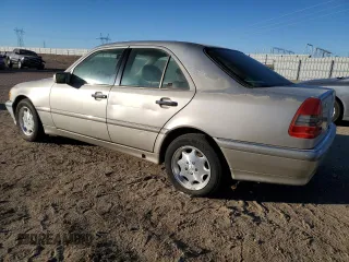 1998 Mercedes-Benz C 230/260/280/320 with VIN WDBHA23G5WA556665, listed as a Copart auction lot 83677634 with 153,901 mi miles and Salvage Title. Bid and sale history available at carsss.com. Image 2.
