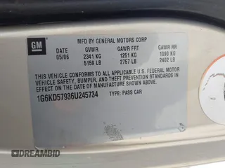 2006 Cadillac DTS 1SE z VIN 1G6KD57936U245734, wystawiony jako IAAI lot #42238256 z przebiegiem 209 188 mil mil oraz . Historia ofert i sprzedaży dostępna na DreamBid. Obrazek 9.