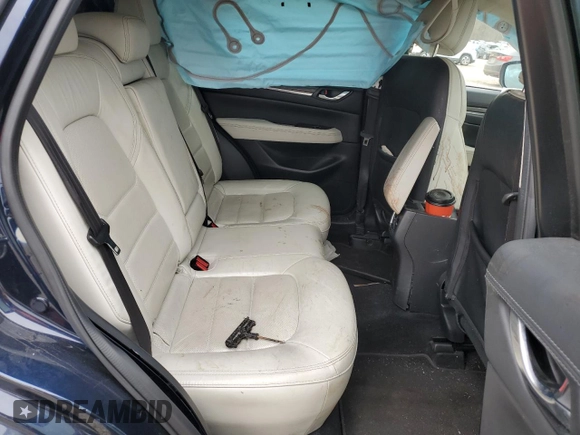 2018 Mazda CX-5 Grand Touring z VIN JM3KFBDM6J0359359, wystawiony jako Copart lot #48018105 z przebiegiem 74 227 mil mil oraz Szkody całkowita. Historia ofert i sprzedaży dostępna na DreamBid. Obrazek 11.