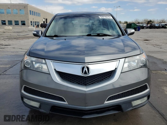 2012 Acura MDX z VIN 2HNYD2H24CH542091, wystawiony jako Copart lot #52818215 z przebiegiem 135 552 mil mil oraz Szkoda całkowita • Salvage title. Historia ofert i sprzedaży dostępna na DreamBid. Obrazek 5.