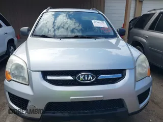 2009 Kia Sportage LX with VIN KNDJF724397572311, listed as a IAAI auction lot 41902158 with 120,899 mi miles and . Bid and sale history available at carsss.com. Image 6.