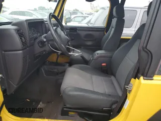 2002 Jeep Wrangler Sport with VIN 1J4FA49S12P746058, listed as a Copart auction lot 75060604 with Not Provided miles and Non Repairable. Bid and sale history available at carsss.com. Image 7.