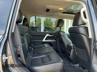 2013 Toyota Land Cruiser z VIN JTMHY7AJ8D4016294, wystawiony jako Copart lot #59005355 z przebiegiem 199 983 mil mil oraz Tytuł czysty. Historia ofert i sprzedaży dostępna na DreamBid. Obrazek 6.