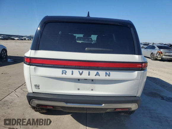2025 Rivian R1S Adventure z VIN 7PDSGBBA3SN046975, wystawiony jako Copart lot #42880125 z przebiegiem Nie podano mil oraz Szkoda całkowita • Salvage title. Historia ofert i sprzedaży dostępna na DreamBid. Obrazek 6.