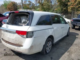 2014 Honda Odyssey EX with VIN 5FNRL5H40EB044303, listed as a IAAI auction lot 41914938 with Not Provided miles and . Bid and sale history available at carsss.com. Image 4.