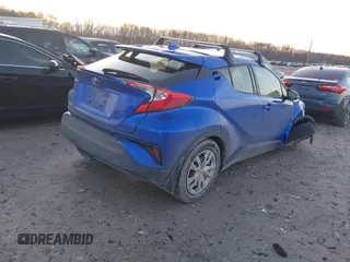 2020 Toyota C-HR LE with VIN JTNKHMBX8L1078376, listed as a IAAI auction lot 41199310 with 95,526 mi miles. Bid and sale history available at carsss.com. Image 4.