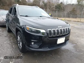 2019 Jeep Cherokee Latitude Plus with VIN 1C4PJMLB0KD341877, listed as a IAAI auction lot 41385053 with 142,627 mi miles. Bid and sale history available at carsss.com. Image 1.