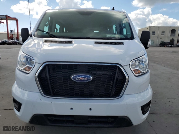 2022 Ford Transit Passenger Wagon XL with VIN 1FBAX2Y84NKA83986, listed as a Copart auction lot 77745014 with 0 mi miles and Salvage Title. Bid and sale history available at carsss.com. Image 5.