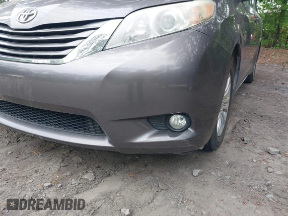 2011 Toyota Sienna XLE AAS with VIN 5TDYK3DC8BS016319, listed as a IAAI auction lot 42186294 with 293,401 mi miles and . Bid and sale history available at DreamBid. Image 6.