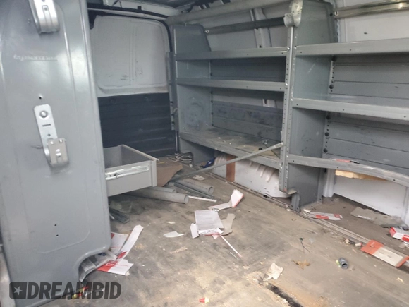 2017 GMC Savana Cargo z VIN 1GTZ7GFG4H1212146, wystawiony jako Copart lot #44348245 z przebiegiem 114 140 mil mil oraz Szkody całkowita. Historia ofert i sprzedaży dostępna na DreamBid. Obrazek 11.