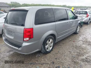2013 Dodge Grand Caravan SE with VIN 2C4RDGBG2DR773577, listed as a IAAI auction lot 41823951 with 226,498 mi miles and . Bid and sale history available at DreamBid. Image 4.