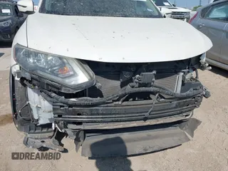 2018 Nissan Rogue SV with VIN 5N1AT2MT2JC702411, listed as a IAAI auction lot 41860534 with 87,997 mi miles and . Bid and sale history available at carsss.com. Image 19.