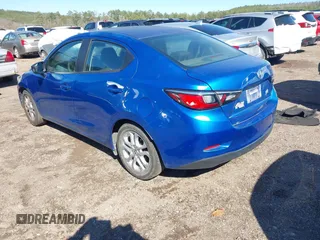 2016 Scion iA with VIN 3MYDLBZV0GY126847, listed as a IAAI auction lot 41588599 with 137,966 mi miles. Bid and sale history available at carsss.com. Image 3.