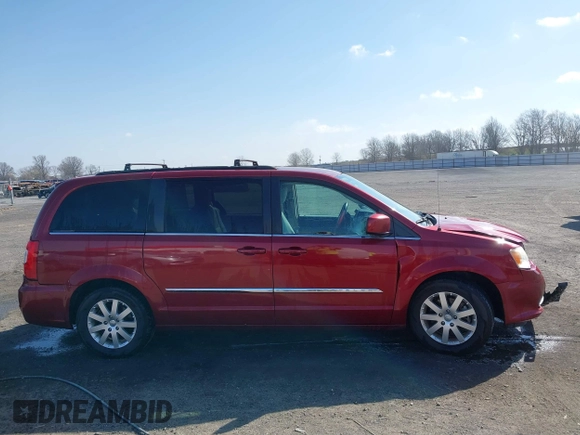 2013 Chrysler Town & Country Touring z VIN 2C4RC1BG7DR777172, wystawiony jako IAAI lot #41780881 z przebiegiem 196 768 mil mil oraz . Historia ofert i sprzedaży dostępna na DreamBid. Obrazek 13.