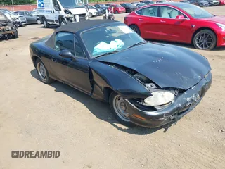 1999 Mazda MX-5 Miata with VIN JM1NB3531X0113843, listed as a IAAI auction lot 42395229 with 134,099 mi miles and . Bid and sale history available at DreamBid. Image 1.