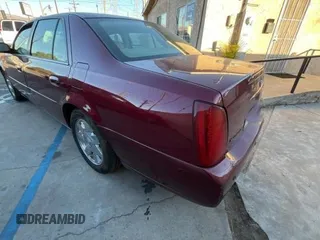 2002 Cadillac DeVille DTS with VIN 1G6KF57912U135771, listed as a Copart auction lot 82052554 with 56,268 mi miles and Clean Title. Bid and sale history available at carsss.com. Image 3.