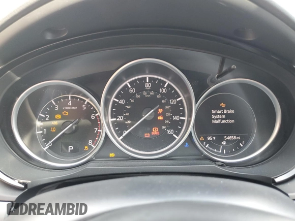 2019 Mazda CX-9 Touring z VIN JM3TCBCY5K0328655, wystawiony jako Copart lot #64627255 z przebiegiem 54 658 mil mil oraz Szkoda całkowita • Salvage title. Historia ofert i sprzedaży dostępna na DreamBid. Obrazek 9.