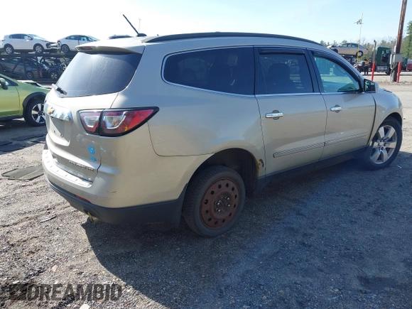 2013 Chevrolet Traverse LTZ z VIN 1GNKVLKD1DJ202428, wystawiony jako IAAI lot #42134820 z przebiegiem 126 532 mil mil oraz . Historia ofert i sprzedaży dostępna na DreamBid. Obrazek 4.