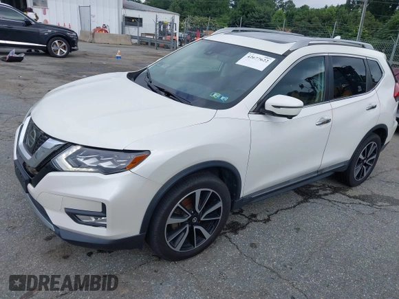 2017 Nissan Rogue SV with VIN 5N1AT2MV5HC812557, listed as a IAAI auction lot 42677622 with 64,686 mi miles and . Bid and sale history available at DreamBid. Image 2.