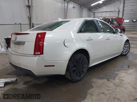 2012 Cadillac CTS Sedan Luxury with VIN 1G6DG5E55C0143029, listed as a IAAI auction lot 42099357 with 90,141 mi miles. Bid and sale history available at carsss.com. Image 4.