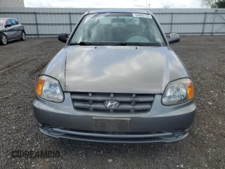 2005 Hyundai Accent GLS with VIN KMHCG35C15U342811, listed as a Copart auction lot 54855705 with 39,299 mi miles and Clean Title. Bid and sale history available at carsss.com. Image 5.