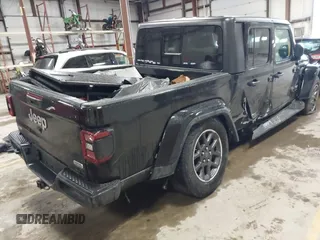 2020 Jeep Gladiator Overland with VIN 1C6HJTFG0LL182931, listed as a IAAI auction lot 41734803 with 75,525 mi miles and . Bid and sale history available at DreamBid. Image 4.