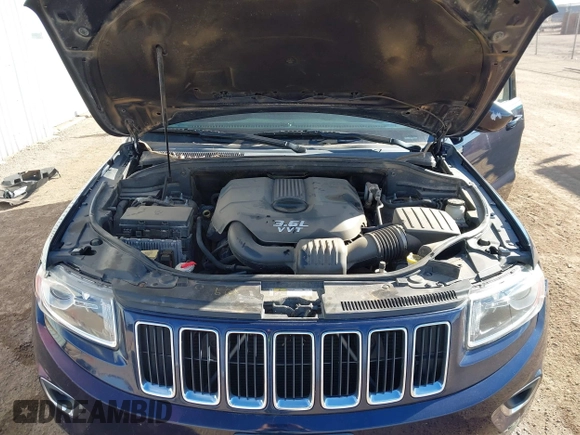2014 Jeep Grand Cherokee Laredo with VIN 1C4RJEAGXEC206879, listed as a IAAI auction lot 41073934 with 160,457 mi miles. Bid and sale history available at carsss.com. Image 10.