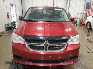 2014 Dodge Grand Caravan SXT z VIN 2C4RDGCG2ER239110, wystawiony jako Copart lot #57247855 z przebiegiem 94 126 mil mil oraz Nie do naprawy. Historia ofert i sprzedaży dostępna na DreamBid. Obrazek 5.
