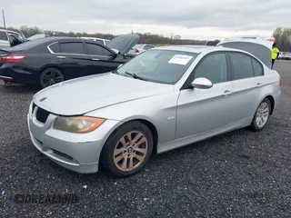 2007 BMW 3 Series 328i with VIN WBAVA33557PG53078, listed as a IAAI auction lot 41936187 with 186,492 mi miles. Bid and sale history available at carsss.com. Image 2.