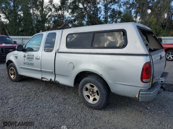 2001 Ford F-150 Work Series with VIN 2FTRX17W21CA26757, listed as a Copart auction lot 79602654 with 0 mi miles and Non Repairable. Bid and sale history available at carsss.com. Image 2.