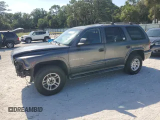 2001 Dodge Durango z VIN 1B4HS28N91F613965, wystawiony jako Copart lot #57208955 z przebiegiem 134 660 mil mil oraz Szkoda całkowita • Salvage title. Historia ofert i sprzedaży dostępna na DreamBid. Obrazek 1.