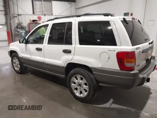 2000 Jeep Grand Cherokee Laredo z VIN 1J4GW48NXYC244327, wystawiony jako IAAI lot #41832166 z przebiegiem 250 822 mil mil oraz . Historia ofert i sprzedaży dostępna na DreamBid. Obrazek 3.