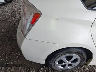 2015 Toyota Prius Four z VIN JTDKN3DU9F1889635, wystawiony jako IAAI lot #42189280 z przebiegiem 119 652 mil mil oraz . Historia ofert i sprzedaży dostępna na DreamBid. Obrazek 12.
