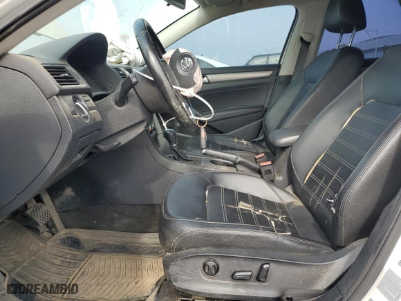 2015 Volkswagen Passat 1.8T Sport with VIN 1VWBT7A3XFC073351, listed as a Copart auction lot 78597824 with 162,590 mi miles and Salvage Title. Bid and sale history available at carsss.com. Image 7.