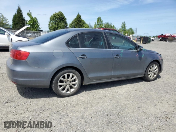 2013 Volkswagen Jetta SE with VIN 3VWDP7AJXDM281723, listed as a Copart auction lot 57235725 with 128,157 mi miles and Salvage title. Bid and sale history available at DreamBid. Image 3.