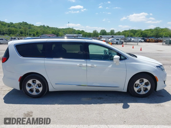 2017 Chrysler Pacifica Touring L Plus with VIN 2C4RC1EG0HR511431, listed as a IAAI auction lot 42242917 with 170,375 mi miles and . Bid and sale history available at DreamBid. Image 13.
