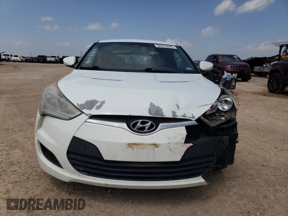 2013 Hyundai Veloster w/Black Int z VIN KMHTC6AD3DU085015, wystawiony jako Copart lot #54473595 z przebiegiem 158 966 mil mil oraz Szkoda całkowita • Salvage title. Historia ofert i sprzedaży dostępna na DreamBid. Obrazek 5.